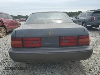 1990 Lexus LS z VIN JT8UF11E6L0017355, wystawiony jako Copart lot #61073224 z przebiegiem 198 258 mil mil oraz Tytuł czysty. Historia ofert i sprzedaży dostępna na DreamBid. Obrazek 6.