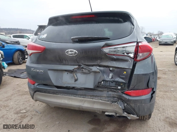 2017 Hyundai Tucson Value with VIN KM8J33A22HU358357, listed as a IAAI auction lot 41583774 with 139,338 mi miles. Bid and sale history available at carsss.com. Image 17.