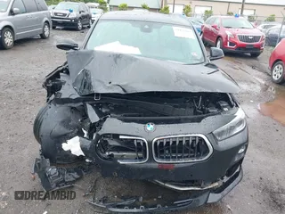 2020 BMW X2 sDrive28i z VIN WBXYH9C01L5P36225, wystawiony jako IAAI lot #39421264 z przebiegiem 70 043 mil mil oraz . Historia ofert i sprzedaży dostępna na DreamBid. Obrazek 12.