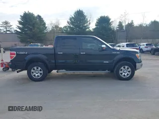 2011 Ford F-150 XLT with VIN 1FTFW1ET7BFA54123, listed as a IAAI auction lot 42119218 with 208,258 mi miles. Bid and sale history available at carsss.com. Image 13.