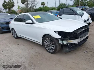 2016 Hyundai Genesis 3.8L with VIN KMHGN4JE6GU140327, listed as a IAAI auction lot 41623499 with 72,942 mi miles. Bid and sale history available at carsss.com. Image 1.