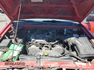 1996 Honda Passport z VIN 4S6CM58V7T4414553, wystawiony jako Copart lot #68566814 z przebiegiem 152 954 mil mil oraz Szkody całkowita. Historia ofert i sprzedaży dostępna na DreamBid. Obrazek 11.