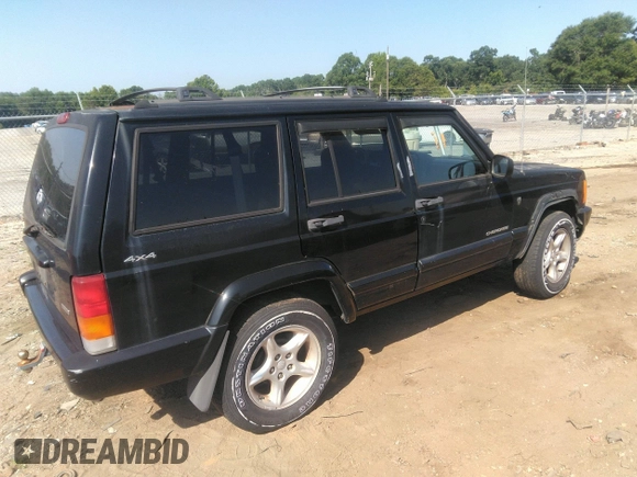 2001 Jeep Cherokee Sport with VIN 1J4FF48S61L621324, listed as a IAAI auction lot 42586960 with 213,198 mi miles and . Bid and sale history available at DreamBid. Image 4.