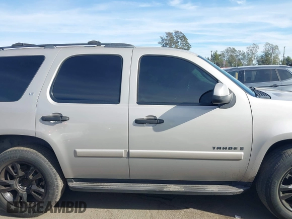 2007 Chevrolet Tahoe LTZ with VIN 1GNFC13077J399911, listed as a IAAI auction lot 41141878 with Not provided miles and . Bid and sale history available at DreamBid. Image 12.