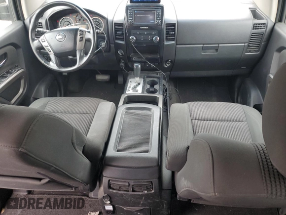 2015 Nissan Titan SV with VIN 1N6AA0EC2FN503980, listed as a Copart auction lot 64664665 with 124,589 mi miles and Clean title. Bid and sale history available at DreamBid. Image 8.
