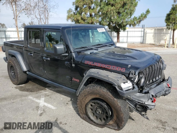 2020 Jeep Gladiator Rubicon z VIN 1C6JJTBG7LL197837, wystawiony jako Copart lot #58169095 z przebiegiem 59 578 mil mil oraz Szkoda całkowita • Salvage title. Historia ofert i sprzedaży dostępna na DreamBid. Obrazek 4.