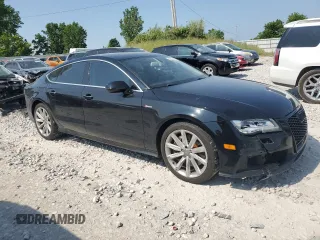 2012 Audi A7 Prestige с VIN WAU2GAFC7CN071874, выставлен на аукционе Copart как лот 61005675 с пробегом 159 046 миль миль и Чистый • Clean title. История ставок и продаж доступна на DreamBid. Изображение 4.