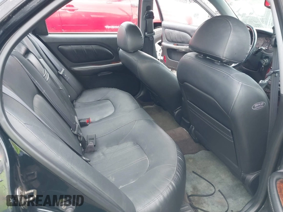 2003 Hyundai Sonata GLS with VIN KMHWF35H23A810622, listed as a IAAI auction lot 41719568 with 94,116 mi miles. Bid and sale history available at carsss.com. Image 8.