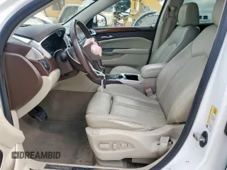 2014 Cadillac SRX Performance Collection with VIN 3GYFNCE39ES687733, listed as a Copart auction lot 62770665 with 151,714 mi miles and Salvage title. Bid and sale history available at DreamBid. Image 7.
