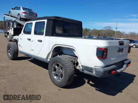 2020 Jeep Gladiator Rubicon with VIN 1C6JJTBG1LL181875, listed as a IAAI auction lot 41722037 with 51,037 mi miles and . Bid and sale history available at DreamBid. Image 3.