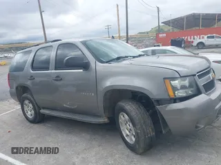 2007 Chevrolet Tahoe LT z VIN 1GNFC13J07J122414, wystawiony jako IAAI lot #39134539 z przebiegiem Nie podano mil oraz . Historia ofert i sprzedaży dostępna na DreamBid. Obrazek 12.