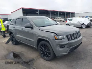 2021 Jeep Grand Cherokee Laredo X with VIN 1C4RJEAG4MC597302, listed as a IAAI auction lot 41919123 with 63,849 mi miles. Bid and sale history available at carsss.com. Image 1.