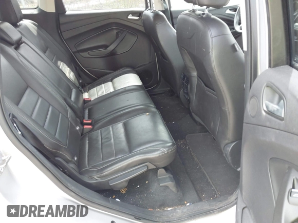 2016 Ford Escape Titanium with VIN 1FMCU9JX3GUA62802, listed as a IAAI auction lot 42001690 with 124,452 mi miles. Bid and sale history available at carsss.com. Image 8.