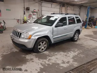 2009 Jeep Grand Cherokee Laredo with VIN 1J8GR48K89C553694, listed as a IAAI auction lot 41984820 with 196,266 mi miles. Bid and sale history available at carsss.com. Image 2.