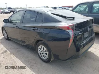 2016 Toyota Prius Two z VIN JTDKBRFU4G3509129, wystawiony jako IAAI lot #42321562 z przebiegiem 246 582 mil mil oraz . Historia ofert i sprzedaży dostępna na DreamBid. Obrazek 3.