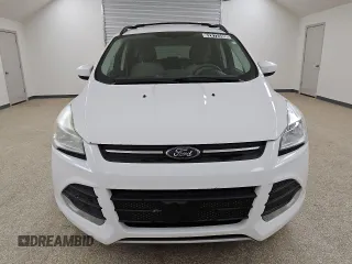 2014 Ford Escape SE с VIN 1FMCU9G93EUE26268, выставлен на аукционе Copart как лот 62872595 с пробегом 174 112 миль миль и Чистый • Clean title. История ставок и продаж доступна на DreamBid. Изображение 5.