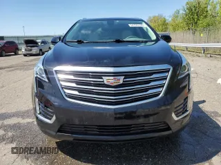 2017 Cadillac XT5 Luxury FWD with VIN 1GYKNBRS1HZ209632, listed as a Copart auction lot 54726155 with 53,924 mi miles and Clean Title. Bid and sale history available at DreamBid. Image 5.