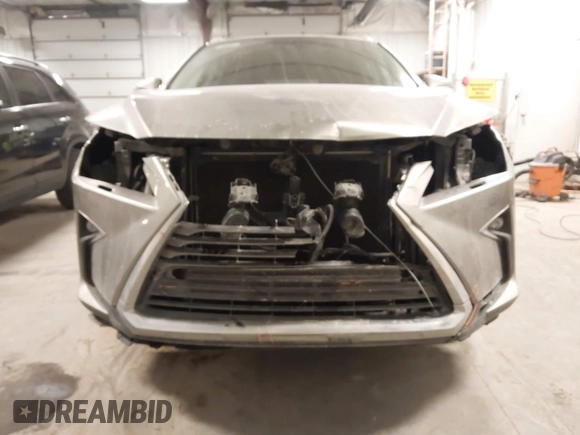 2018 Lexus RX 350L Premium z VIN JTJDZKCA6J2004385, wystawiony jako IAAI lot #41382429 z przebiegiem 111 638 mil mil oraz . Historia ofert i sprzedaży dostępna na DreamBid. Obrazek 6.
