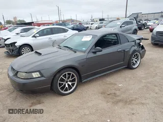 2004 Ford Mustang GT Deluxe with VIN 1FAFP42X74F115520, listed as a IAAI auction lot 41842751 with 179,665 mi miles and . Bid and sale history available at DreamBid. Image 2.