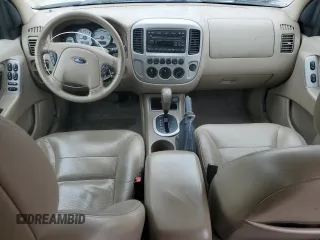 2005 Ford Escape Limited z VIN 1FMYU04195KB37679, wystawiony jako Copart lot #50656585 z przebiegiem 218 891 mil mil oraz Szkoda całkowita • Salvage title. Historia ofert i sprzedaży dostępna na DreamBid. Obrazek 8.