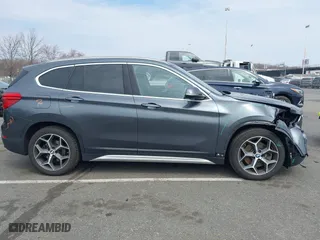 2019 BMW X1 xDrive28i with VIN WBXHT3C51K5L90571, listed as a IAAI auction lot 41909209 with 35,902 mi miles. Bid and sale history available at carsss.com. Image 13.