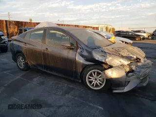 2018 Toyota Prius Two z VIN JTDKBRFU4J3058128, wystawiony jako Copart lot #83424624 z przebiegiem 87 440 mil mil oraz Szkoda całkowita • Salvage title. Historia ofert i sprzedaży dostępna na DreamBid. Obrazek 4.