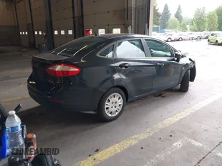 2014 Ford Fiesta S with VIN 3FADP4AJ3EM136578, listed as a IAAI auction lot 42300263 with 122,099 mi miles and . Bid and sale history available at DreamBid. Image 4.