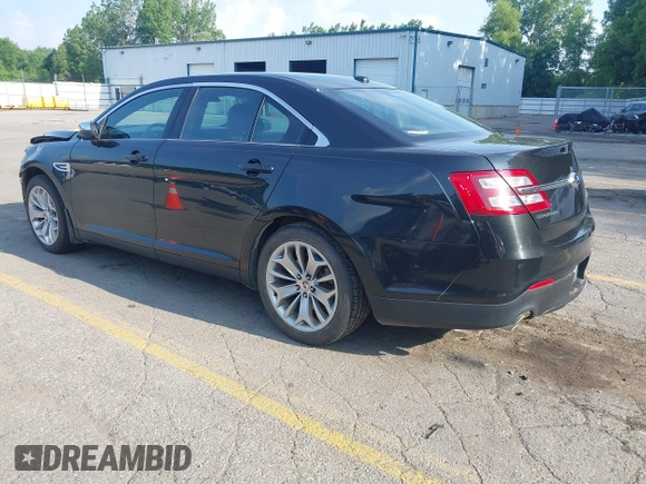 2014 Ford Taurus Limited with VIN 1FAHP2F86EG163392, listed as a IAAI auction lot 42538336 with 131,910 mi miles and . Bid and sale history available at DreamBid. Image 3.
