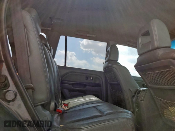 2003 Honda Pilot EX z VIN 2HKYF18583H593038, wystawiony jako Copart lot #59750725 z przebiegiem 249 921 mil mil oraz Czysty tytuł • Clean title. Historia ofert i sprzedaży dostępna na DreamBid. Obrazek 11.