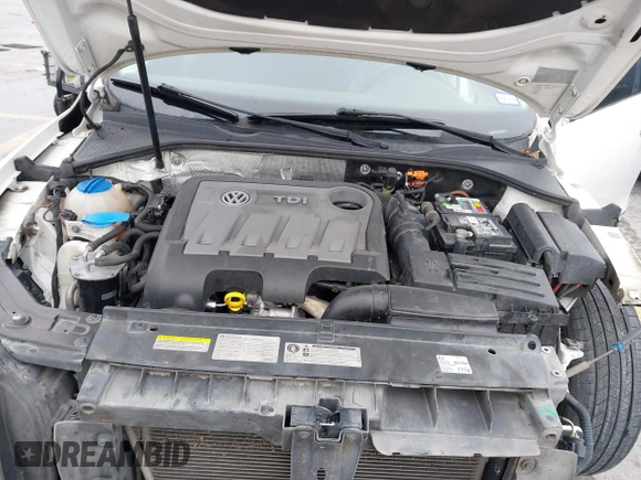 2014 Volkswagen Passat TDI SEL Premium with VIN 1VWCN7A32EC035738, listed as a IAAI auction lot 41641843 with 151,159 mi miles. Bid and sale history available at carsss.com. Image 10.