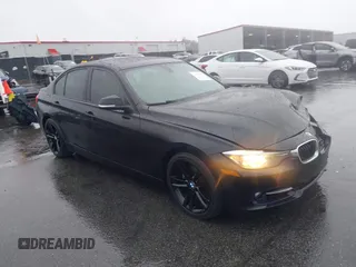 2015 BMW 3 Series 328i with VIN WBA3A5G54FNS88834, listed as a IAAI auction lot 41712756 with 51,599 mi miles. Bid and sale history available at carsss.com. Image 1.