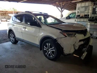 2017 Toyota RAV4 LE with VIN JTMBFREV7HJ148815, listed as a Copart auction lot 82632724 with 24,775 mi miles and Salvage Title. Bid and sale history available at DreamBid. Image 4.