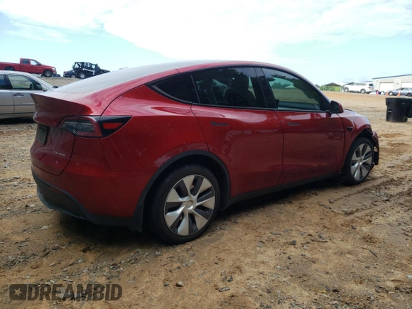 2024 Tesla Model Y Long Range with VIN 7SAYGDEE2RA269884, listed as a Copart auction lot 56937585 with 49,374 mi miles and Salvage title. Bid and sale history available at DreamBid. Image 3.