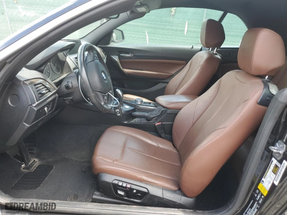 2015 BMW 2 Series 228i xDrive with VIN WBA1K7C51FV472540, listed as a Copart auction lot 63658174 with 119,567 mi miles and Salvage Title. Bid and sale history available at carsss.com. Image 7.