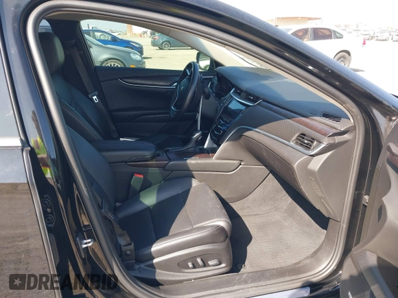 2018 Cadillac XTS Luxury with VIN 2G61M5S36J9120571, listed as a IAAI auction lot 41486816 with 77,302 mi miles. Bid and sale history available at carsss.com. Image 5.