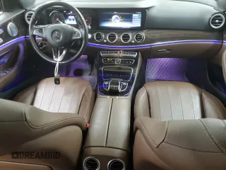 2017 Mercedes-Benz E 300 Luxury with VIN WDDZF4KB5HA054823, listed as a Copart auction lot 63022395 with 60,890 mi miles and Salvage title. Bid and sale history available at DreamBid. Image 8.