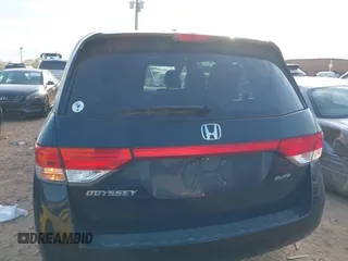 2014 Honda Odyssey Touring with VIN 5FNRL5H90EB077054, listed as a IAAI auction lot 41904456 with 197,869 mi miles and . Bid and sale history available at carsss.com. Image 16.