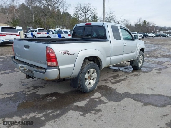 2005 Toyota Tacoma with VIN 5TEUU42N85Z043059, listed as a IAAI auction lot 41690129 with 129,927 mi miles. Bid and sale history available at carsss.com. Image 4.
