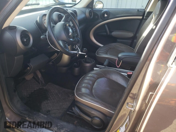 2011 MINI Countryman with VIN WMWZB3C59BWH94894, listed as a Copart auction lot 47979475 with 140,594 mi miles and Clean title. Bid and sale history available at DreamBid. Image 7.