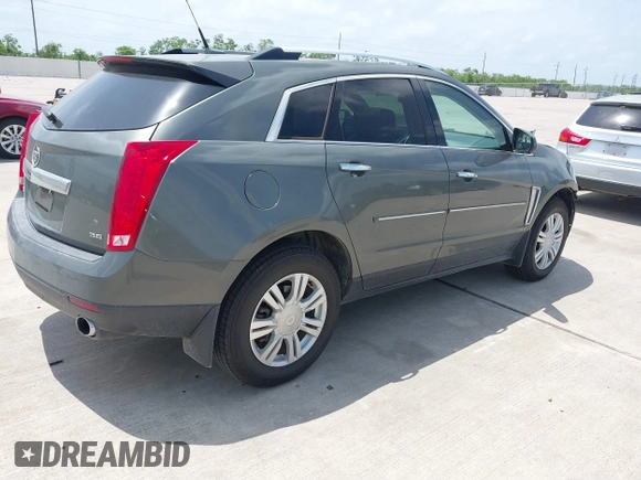 2013 Cadillac SRX Luxury Collection z VIN 3GYFNCE39DS542125, wystawiony jako IAAI lot #42067672 z przebiegiem 158 013 mil mil oraz . Historia ofert i sprzedaży dostępna na DreamBid. Obrazek 4.