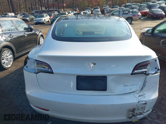 2021 Tesla Model 3 Long Range with VIN 5YJ3E1EB1MF056759, listed as a IAAI auction lot 41464108 with 48,694 mi miles and . Bid and sale history available at carsss.com. Image 16.
