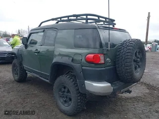 2011 Toyota FJ Cruiser with VIN JTEBU4BF5BK108168, listed as a IAAI auction lot 41829688 with 163,354 mi miles. Bid and sale history available at carsss.com. Image 3.