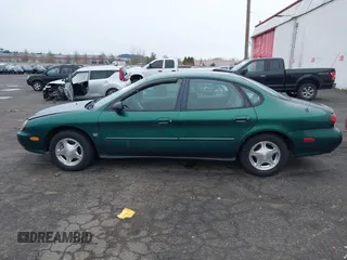 1999 Ford Taurus z VIN 1FAFP52S9XG309250, wystawiony jako IAAI lot #41797222 z przebiegiem 102 676 mil mil oraz . Historia ofert i sprzedaży dostępna na DreamBid. Obrazek 14.