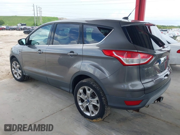 2013 Ford Escape SEL with VIN 1FMCU0HX8DUB61208, listed as a IAAI auction lot 42575283 with 140,330 mi miles and . Bid and sale history available at DreamBid. Image 3.