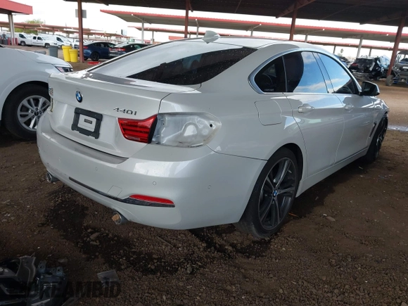 2018 BMW 4 Series 440i with VIN WBA4J5C56JBF07770, listed as a IAAI auction lot 41948710 with 69,655 mi miles and . Bid and sale history available at carsss.com. Image 4.