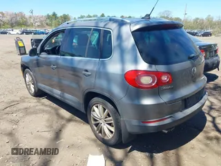 2011 Volkswagen Tiguan SE with VIN WVGBV7AX8BW514320, listed as a IAAI auction lot 42138794 with 76,079 mi miles and . Bid and sale history available at DreamBid. Image 3.