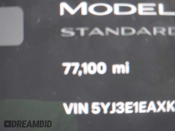 2019 Tesla Model 3 Mid Range with VIN 5YJ3E1EAXKF296378, listed as a IAAI auction lot 41739616 with 77,100 mi miles and . Bid and sale history available at DreamBid. Image 14.