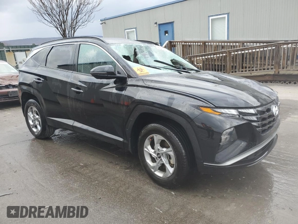 2023 Hyundai Tucson SEL with VIN 5NMJBCAE2PH270674, listed as a Copart auction lot 82879614 with 11,673 mi miles and Salvage Title. Bid and sale history available at DreamBid. Image 4.