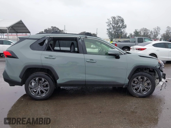 2023 Toyota RAV4 Hybrid XLE Premium with VIN JTMB6RFVXPD104349, listed as a IAAI auction lot 41730288 with 30,904 mi miles. Bid and sale history available at carsss.com. Image 13.