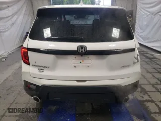 2024 Honda Passport EX-L z VIN 5FNYF8H54RB020153, wystawiony jako Copart lot #59444465 z przebiegiem 13 958 mil mil oraz Szkoda całkowita • Salvage title. Historia ofert i sprzedaży dostępna na DreamBid. Obrazek 6.